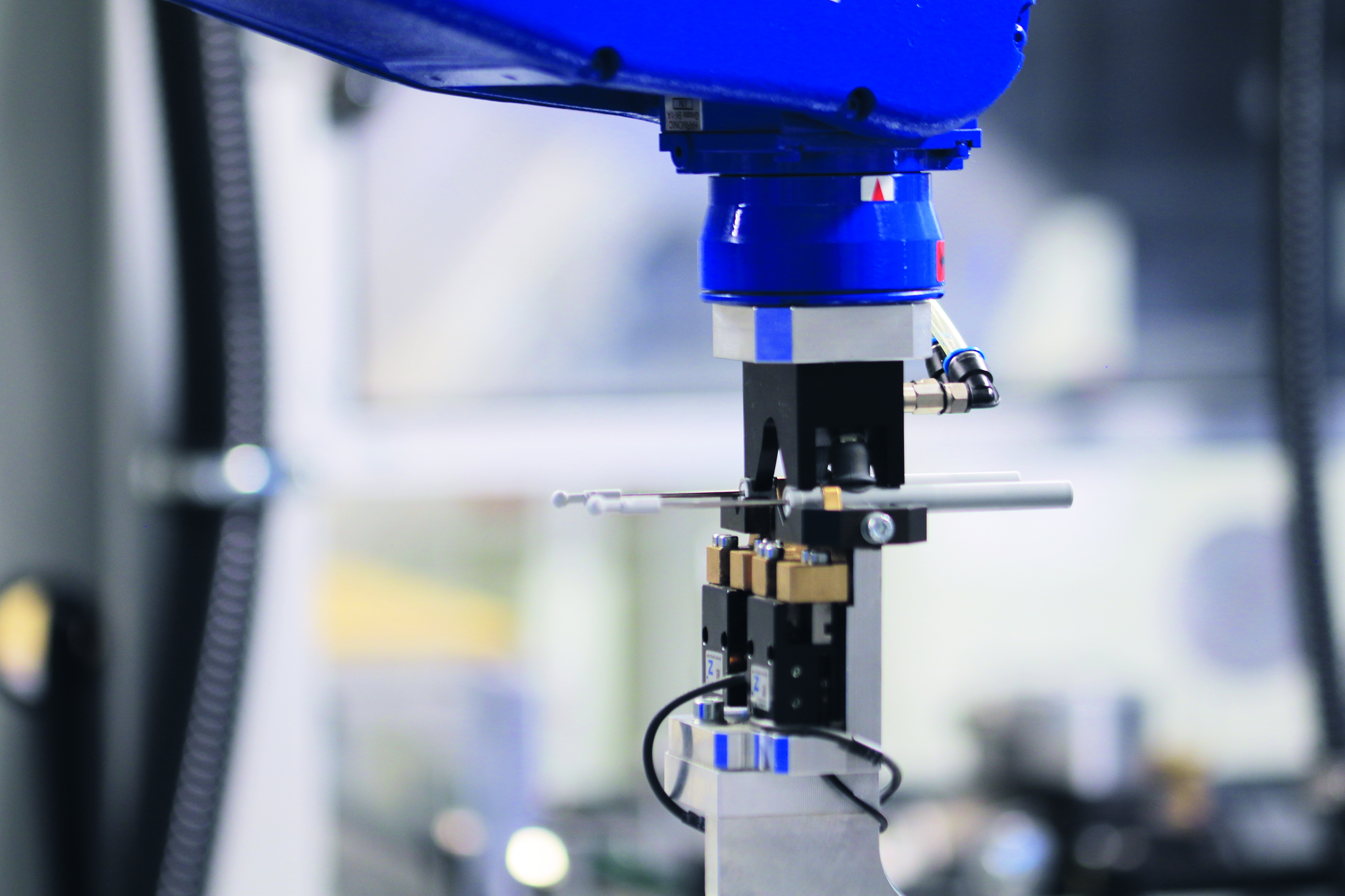 Robotic handling and process control support high-volume damper output with tight tolerances and stable quality