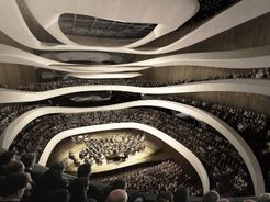 El Sinfonia Varsovia Concert Hall en Varsovia mezcla estructuras históricas con un audaz nuevo volumen, creando un hito cultural diseñado para resonar con las audiencias por generaciones